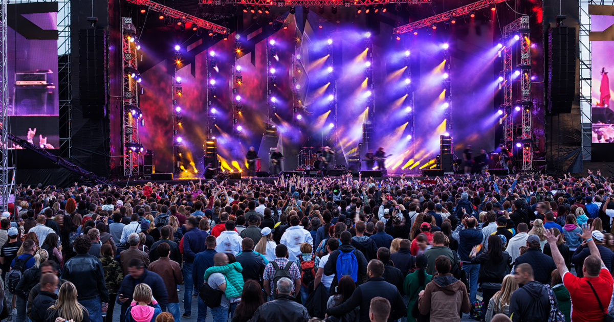 Large scale concert with lots of people in audience