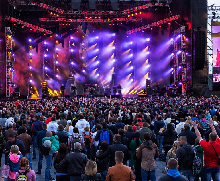 Large scale concert with lots of people in audience