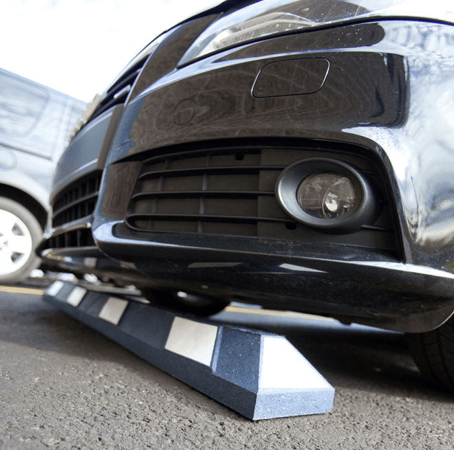 Rubber parking stops are superior to concrete parking stops
